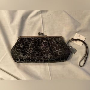 Coach black material wristlet.